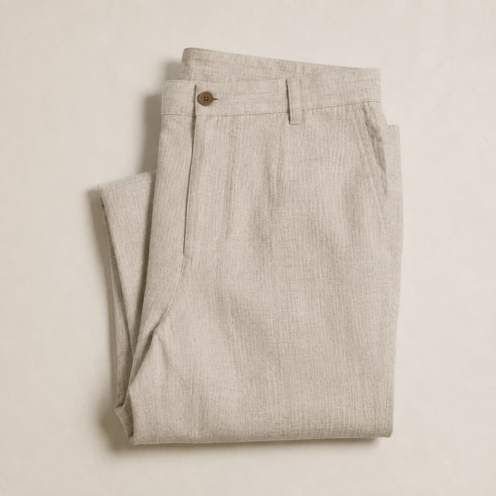 the ecru linen trousers, photographed lying flat